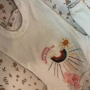 Vibrant rainbow style one piece